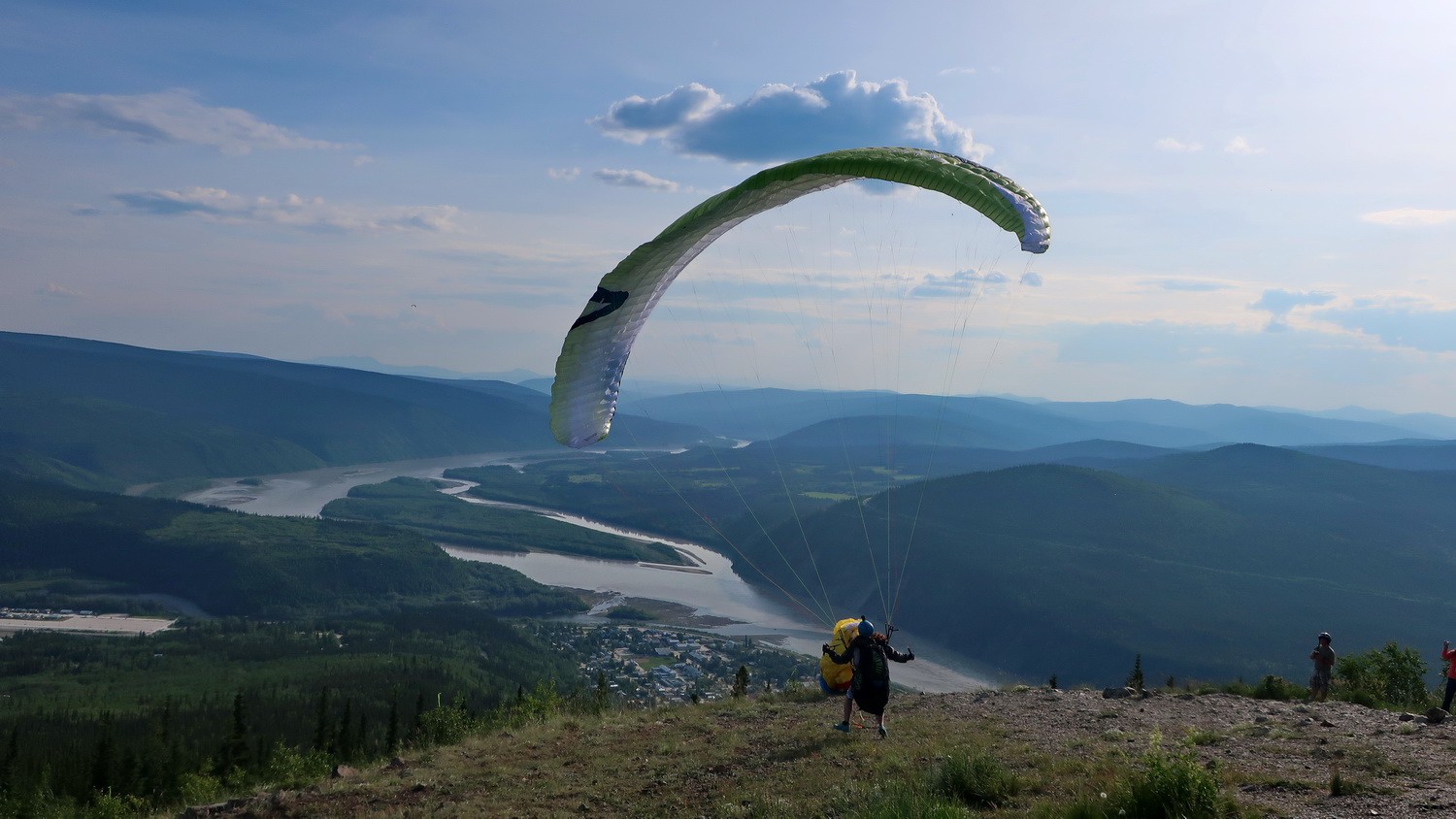 Glider on Midnight Dome with Yukon River and Dawson City